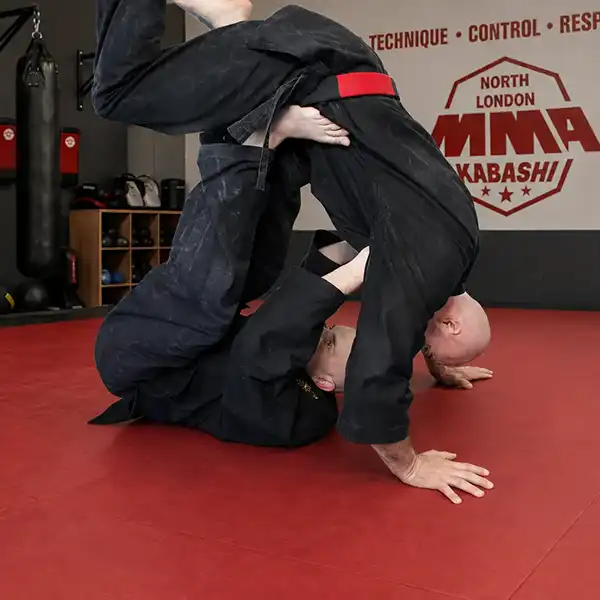 Small-group MMA takedown training
